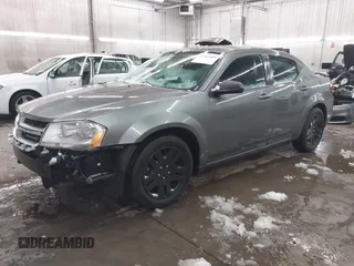 2013 Dodge Avenger SE with VIN 1C3CDZAB1DN581303, listed as a IAAI auction lot 41942469 with 123,330 mi miles. Bid and sale history available at carsss.com. Image 2.