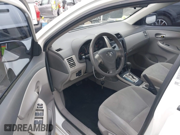 2010 Toyota Corolla with VIN 2T1BU4EE0AC359882, listed as a IAAI auction lot 42051633 with 227,481 mi miles. Bid and sale history available at carsss.com. Image 5.
