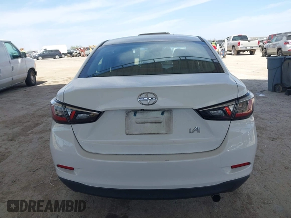 2016 Scion iA with VIN 3MYDLBZV3GY101182, listed as a IAAI auction lot 41788071 with 92,406 mi miles. Bid and sale history available at carsss.com. Image 16.