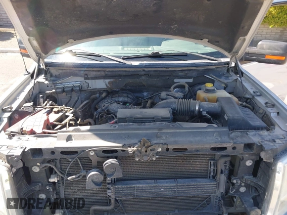 2014 Ford F-150 XL with VIN 1FTEX1CM2EFB01776, listed as a IAAI auction lot 41806274 with 157,704 mi miles. Bid and sale history available at carsss.com. Image 10.