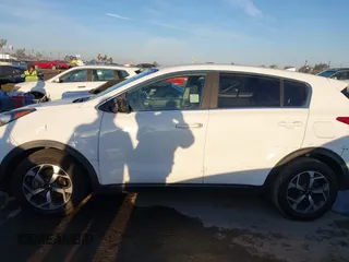 2020 Kia Sportage LX with VIN KNDPM3AC2L7733689, listed as a IAAI auction lot 41858043 with 93,979 mi miles and . Bid and sale history available at DreamBid. Image 14.