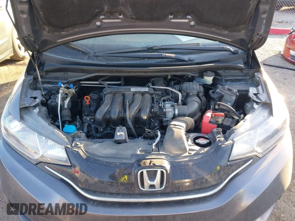 2015 Honda Fit EX-L with VIN 3HGGK5H85FM755006, listed as a IAAI auction lot 41034606 with 97,294 mi miles and . Bid and sale history available at DreamBid. Image 10.