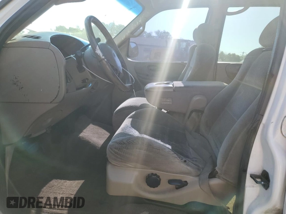 2001 Ford F-150 XLT with VIN 1FTRW07W11KB44405, listed as a Copart auction lot 53560595 with 272,881 mi miles and Salvage title. Bid and sale history available at DreamBid. Image 7.