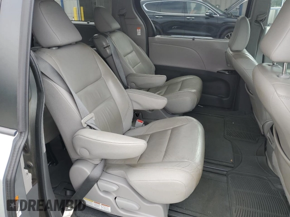 2016 Toyota Sienna XLE with VIN 5TDYK3DC8GS715148, listed as a Copart auction lot 57834045 with 128,769 mi miles and Salvage title. Bid and sale history available at DreamBid. Image 11.