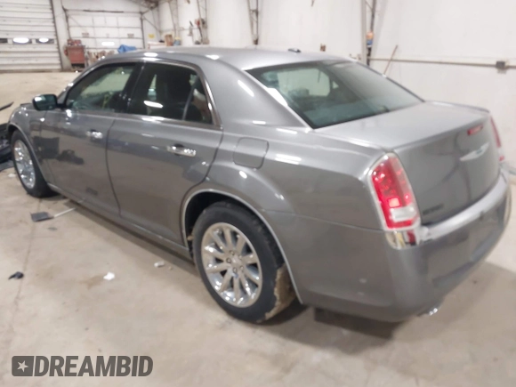 2012 Chrysler 300 Limited with VIN 2C3CCACG3CH173700, listed as a IAAI auction lot 41803306 with 90,924 mi miles. Bid and sale history available at carsss.com. Image 3.