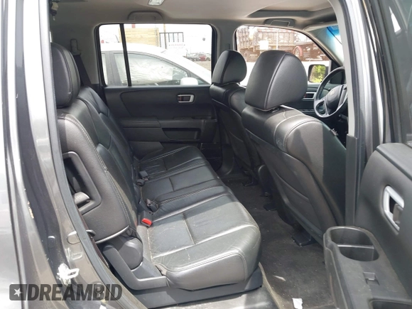 2012 Honda Pilot EX-L with VIN 5FNYF4H52CB081078, listed as a IAAI auction lot 42340966 with 223,319 mi miles and . Bid and sale history available at DreamBid. Image 8.