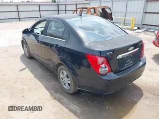 2013 Chevrolet Sonic LT with VIN 1G1JC5SH6D4245940, listed as a IAAI auction lot 42124231 with 1 mi miles. Bid and sale history available at carsss.com. Image 3.
