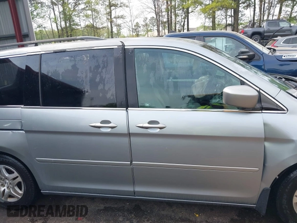 2006 Honda Odyssey EX with VIN 5FNRL38406B066176, listed as a IAAI auction lot 42028052 with 136,305 mi miles and . Bid and sale history available at DreamBid. Image 14.