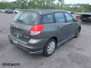 2004 Toyota Matrix Std with VIN 2T1KR32E14C194171, listed as a IAAI auction lot 42059685 with 299,999 mi miles. Bid and sale history available at carsss.com. Image 4.