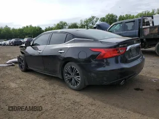 2016 Nissan Maxima SR with VIN 1N4AA6AP9GC447540, listed as a Copart auction lot 60861815 with 127,420 mi miles and Salvage title. Bid and sale history available at DreamBid. Image 2.