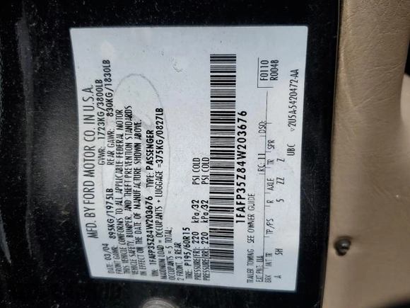 2004 Ford Focus ZTW with VIN 1FAFP35Z84W203676, listed as a Copart auction lot 57272835 with 183,115 mi miles and Salvage title. Bid and sale history available at DreamBid. Image 12.