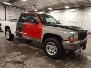 1997 Dodge Dakota z VIN 1B7GG23Y6VS145997, wystawiony jako IAAI lot #41746103 z przebiegiem 187 647 mil mil oraz . Historia ofert i sprzedaży dostępna na DreamBid. Obrazek 1.