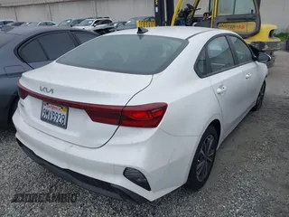 2024 Kia Forte LXS with VIN 3KPF24ADXRE801620, listed as a IAAI auction lot 41861531 with 1,786 mi miles. Bid and sale history available at carsss.com. Image 4.