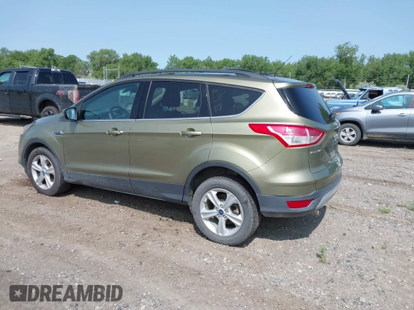 2013 Ford Escape SE with VIN 1FMCU9GX0DUA54515, listed as a IAAI auction lot 42330534 with 113,484 mi miles and . Bid and sale history available at DreamBid. Image 3.