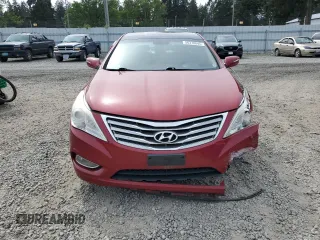 2012 Hyundai Azera z VIN KMHFH4JG3CA157800, wystawiony jako Copart lot #56370845 z przebiegiem 87 180 mil mil oraz Szkoda całkowita • Salvage title. Historia ofert i sprzedaży dostępna na DreamBid. Obrazek 5.