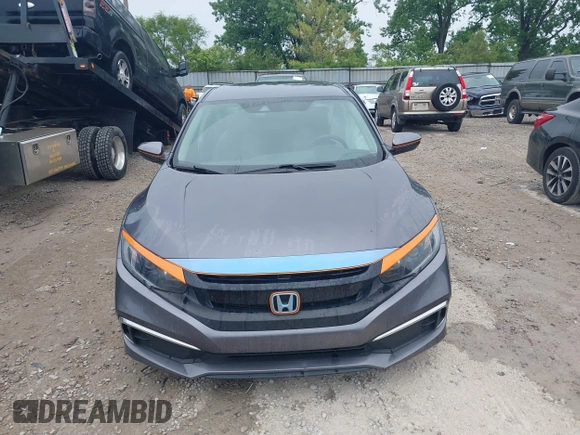 2020 Honda Civic LX z VIN 19XFC2F66LE012481, wystawiony jako IAAI lot #42297600 z przebiegiem 56 602 mil mil oraz . Historia ofert i sprzedaży dostępna na DreamBid. Obrazek 13.