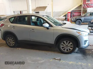 2016 Mazda CX-5 Sport with VIN JM3KE2BE5G0720507, listed as a IAAI auction lot 41872003 with 160,727 mi miles and . Bid and sale history available at carsss.com. Image 13.