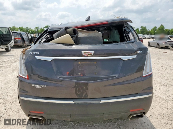 2018 Cadillac XT5 FWD with VIN 1GYKNARS6JZ147628, listed as a Copart auction lot 57516595 with 113,092 mi miles and Non repairable. Bid and sale history available at DreamBid. Image 6.