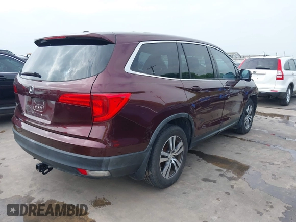 2016 Honda Pilot EX with VIN 5FNYF5H30GB026736, listed as a IAAI auction lot 41900082 with 144,460 mi miles. Bid and sale history available at carsss.com. Image 4.