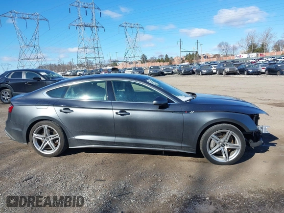 2021 Audi A5 Sportback S line Premium Plus with VIN WAUFACF52MA047877, listed as a IAAI auction lot 41643604 with 34,912 mi miles. Bid and sale history available at carsss.com. Image 13.