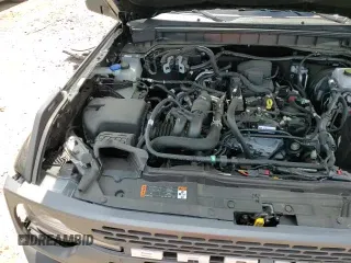 2023 Ford Bronco z VIN 1FMEE5DH5PLB74378, wystawiony jako Copart lot #57410365 z przebiegiem 13 060 mil mil oraz Szkoda całkowita • Salvage title. Historia ofert i sprzedaży dostępna na DreamBid. Obrazek 15.