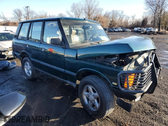 1994 Land Rover Range Rover with VIN SALHV1245RA640425, listed as a Copart auction lot 84764404 with 173,181 mi miles and Salvage Title. Bid and sale history available at DreamBid. Image 4.