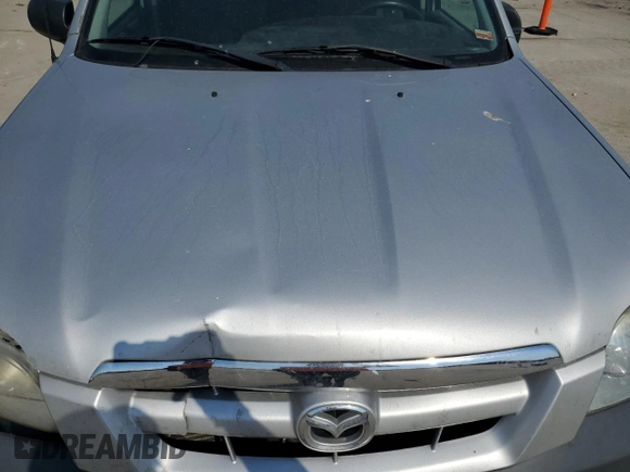 2006 Mazda Tribute i with VIN 4F2YZ02Z26KM31859, listed as a Copart auction lot 48413025 with 152,663 mi miles and Salvage Title. Bid and sale history available at carsss.com. Image 12.