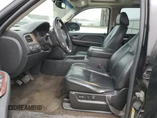 2009 GMC Yukon SLT 4SB with VIN 1GKFK33009R280856, listed as a Copart auction lot 51522635 with 265,941 mi miles and Salvage Title. Bid and sale history available at DreamBid. Image 7.
