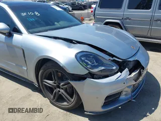2020 Porsche Panamera z VIN WP0AA2A75LL101708, wystawiony jako IAAI lot #39900713 z przebiegiem 13 098 mil mil oraz . Historia ofert i sprzedaży dostępna na DreamBid. Obrazek 6.