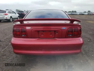 1997 Ford Mustang with VIN 1FALP4040VF166533, listed as a Copart auction lot 66524354 with 71,082 mi miles and Salvage Title. Bid and sale history available at carsss.com. Image 6.