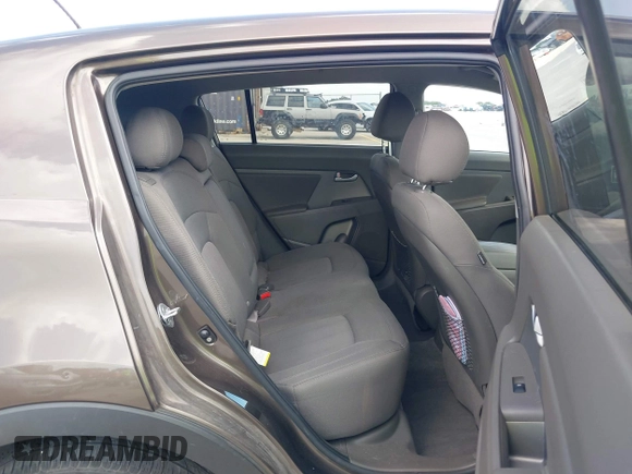 2013 Kia Sportage LX with VIN KNDPB3A28D7375304, listed as a IAAI auction lot 42566081 with 17,890 mi miles and . Bid and sale history available at DreamBid. Image 8.