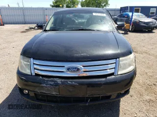 2009 Ford Taurus SE with VIN 1FAHP23W29G109225, listed as a Copart auction lot 58227024 with 0 mi miles and Salvage Title. Bid and sale history available at carsss.com. Image 5.