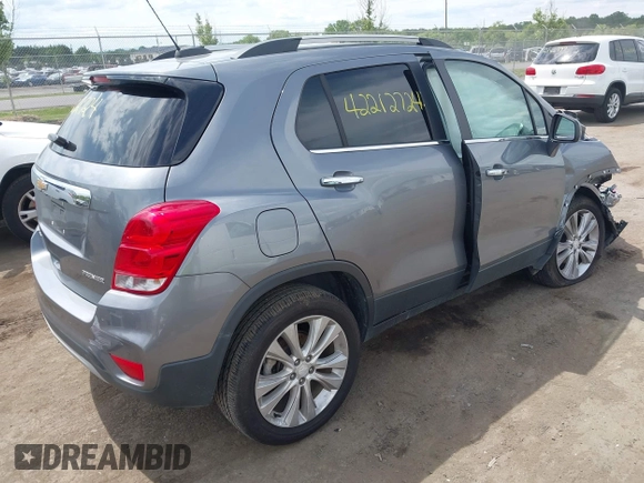 2020 Chevrolet Trax Premier with VIN 3GNCJRSB2LL140689, listed as a IAAI auction lot 42212724 with 73,701 mi miles and . Bid and sale history available at DreamBid. Image 4.
