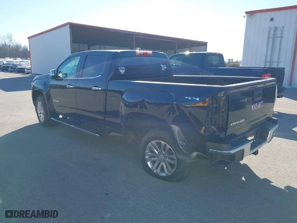 2015 GMC Canyon 4WD SLT with VIN 1GTG6CE33F1134747, listed as a IAAI auction lot 41502300 with 143,027 mi miles. Bid and sale history available at carsss.com. Image 3.