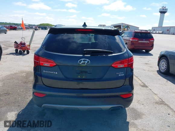 2014 Hyundai Santa Fe with VIN 5XYZUDLB0EG187984, listed as a IAAI auction lot 42607599 with 111,594 mi miles and . Bid and sale history available at DreamBid. Image 16.