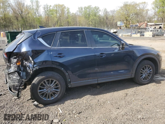 2019 Mazda CX-5 Touring with VIN JM3KFBCM6K0591608, listed as a Copart auction lot 53518385 with 61,618 mi miles and Salvage Title. Bid and sale history available at carsss.com. Image 3.