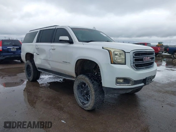 2018 GMC Yukon XL SLT with VIN 1GKS2GKCXJR315537, listed as a IAAI auction lot 41541293 with 114,672 mi miles. Bid and sale history available at carsss.com. Image 1.