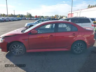 2015 Mitsubishi Lancer SE with VIN JA32V2FW7FU024779, listed as a IAAI auction lot 40681839 with Not Provided miles. Bid and sale history available at carsss.com. Image 14.