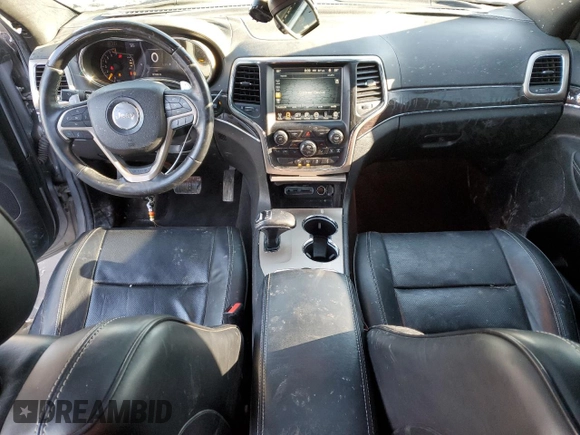 2014 Jeep Grand Cherokee Overland with VIN 1C4RJFCG2EC281062, listed as a Copart auction lot 47099225 with 127,660 mi miles and Salvage Title. Bid and sale history available at carsss.com. Image 8.