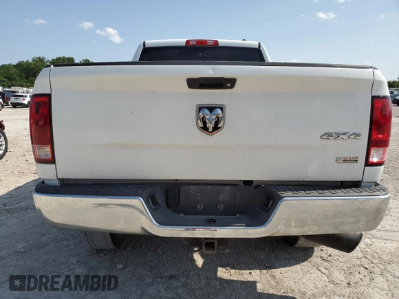 2012 Ram 2500 ST z VIN 3C6UD5CL8CG235889, wystawiony jako Copart lot #58773955 z przebiegiem 187 522 mil mil oraz Szkoda całkowita • Salvage title. Historia ofert i sprzedaży dostępna na DreamBid. Obrazek 6.