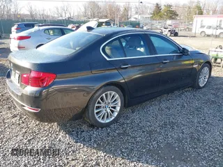 2014 BMW 5 Series 528i xDrive with VIN WBA5A7C54ED616297, listed as a IAAI auction lot 41877809 with 147,874 mi miles and . Bid and sale history available at DreamBid. Image 4.