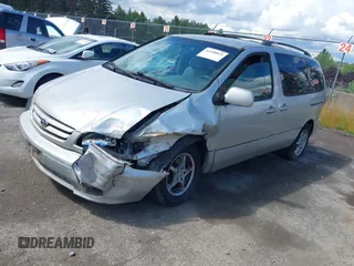 2002 Toyota Sienna LE with VIN 4T3ZF13C02U421846, listed as a IAAI auction lot 42250815 with 182,268 mi miles and . Bid and sale history available at DreamBid. Image 2.