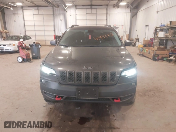 2020 Jeep Cherokee Trailhawk z VIN 1C4PJMBX8LD627104, wystawiony jako IAAI lot #41493732 z przebiegiem 46 463 mil mil oraz . Historia ofert i sprzedaży dostępna na DreamBid. Obrazek 12.