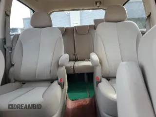 2011 Kia Sedona LX with VIN KNDMG4C72B6369858, listed as a Copart auction lot 70339124 with 165,640 mi miles and Salvage Title. Bid and sale history available at carsss.com. Image 10.