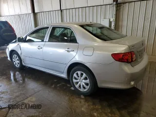 2010 Toyota Corolla with VIN 1NXBU4EE9AZ359085, listed as a Copart auction lot 62379755 with 107,160 mi miles and Salvage title. Bid and sale history available at DreamBid. Image 2.