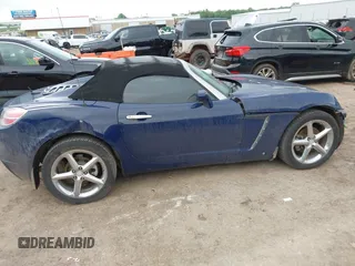 2009 Saturn Sky Red Line z VIN 1G8MT35X09Y105064, wystawiony jako IAAI lot #42197028 z przebiegiem 106 673 mil mil oraz . Historia ofert i sprzedaży dostępna na DreamBid. Obrazek 13.