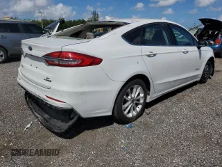 2019 Ford Fusion Hybrid SE with VIN 3FA6P0LU9KR257039, listed as a Copart auction lot 60137022 with 65,911 mi miles. Bid and sale history available at carsss.com. Image 4.