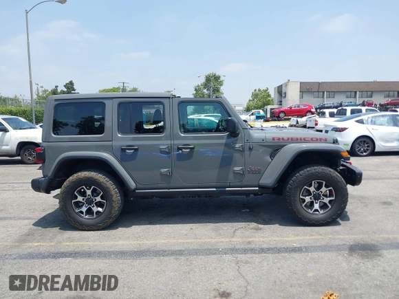 2020 Jeep Wrangler Unlimited Rubicon with VIN 1C4HJXFG3LW279636, listed as a IAAI auction lot 42430354 with 19,631 mi miles and . Bid and sale history available at DreamBid. Image 14.