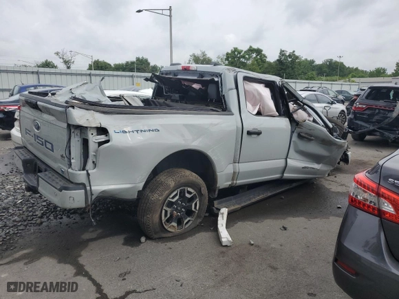 2023 Ford F-150 Lightning Pro with VIN 1FTVW1EL9PWG58758, listed as a Copart auction lot 64410814 with 0 mi miles and Salvage Title. Bid and sale history available at carsss.com. Image 3.