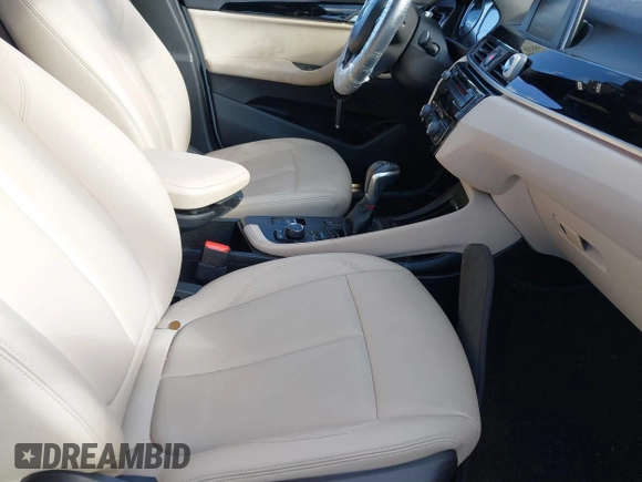 2018 BMW X1 xDrive28i with VIN WBXHT3C34J5L29714, listed as a IAAI auction lot 41825126 with 89,970 mi miles. Bid and sale history available at carsss.com. Image 5.